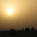 Humvees at dusk